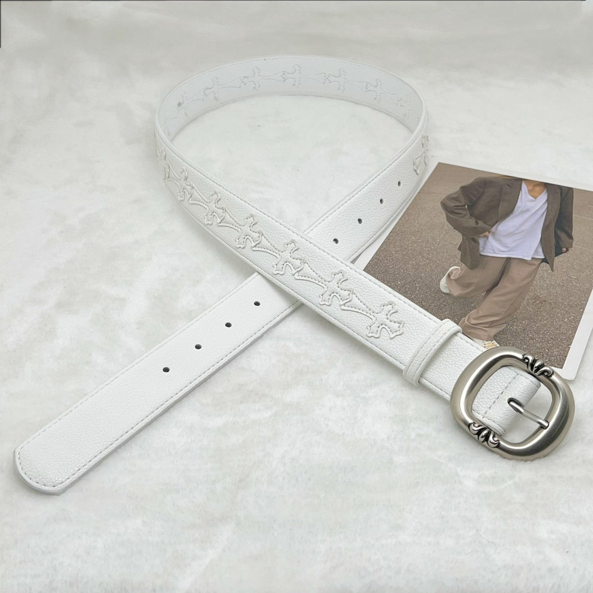 Cross with belt