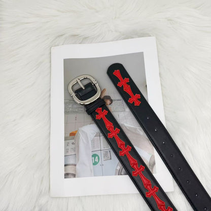 Cross with belt