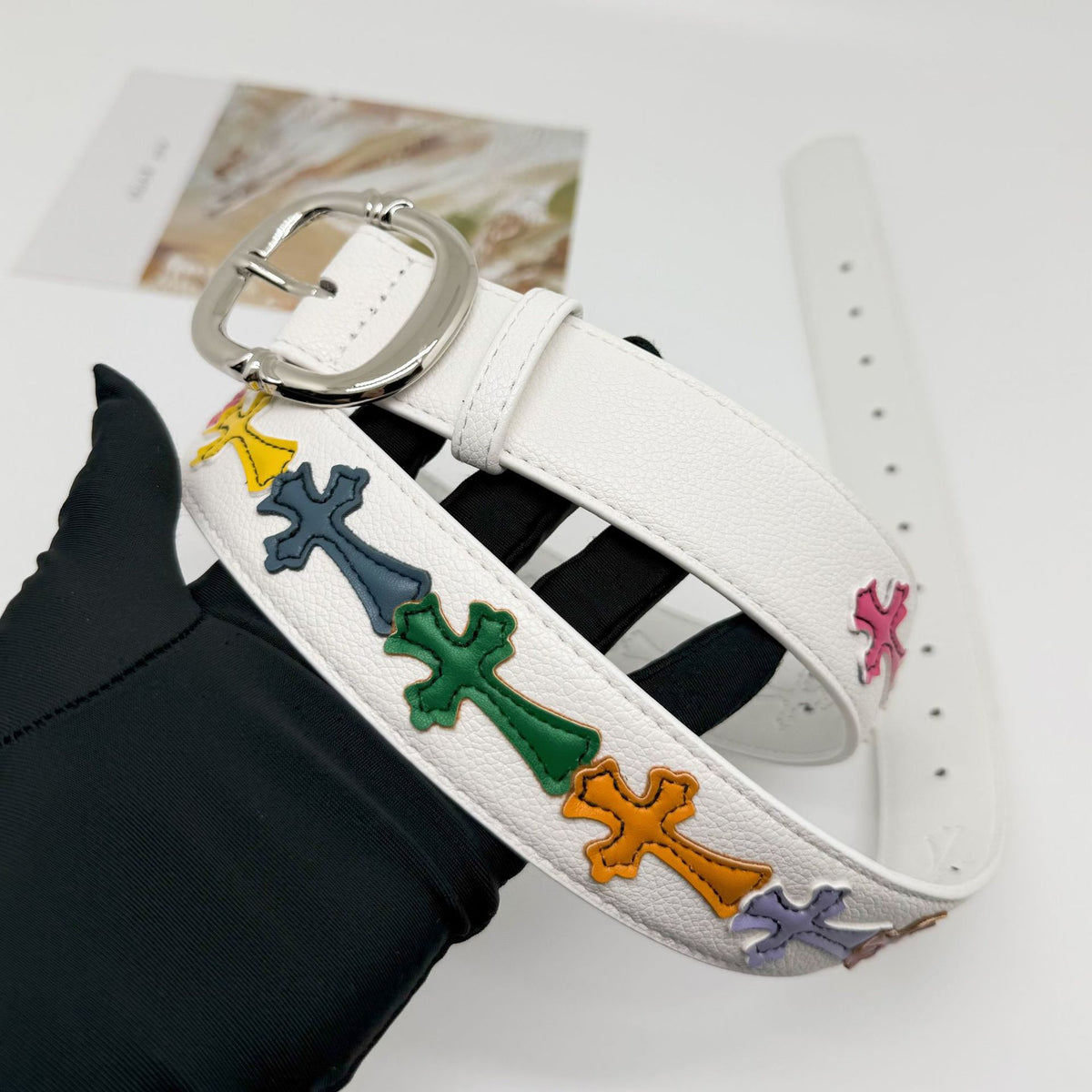 Cross with belt
