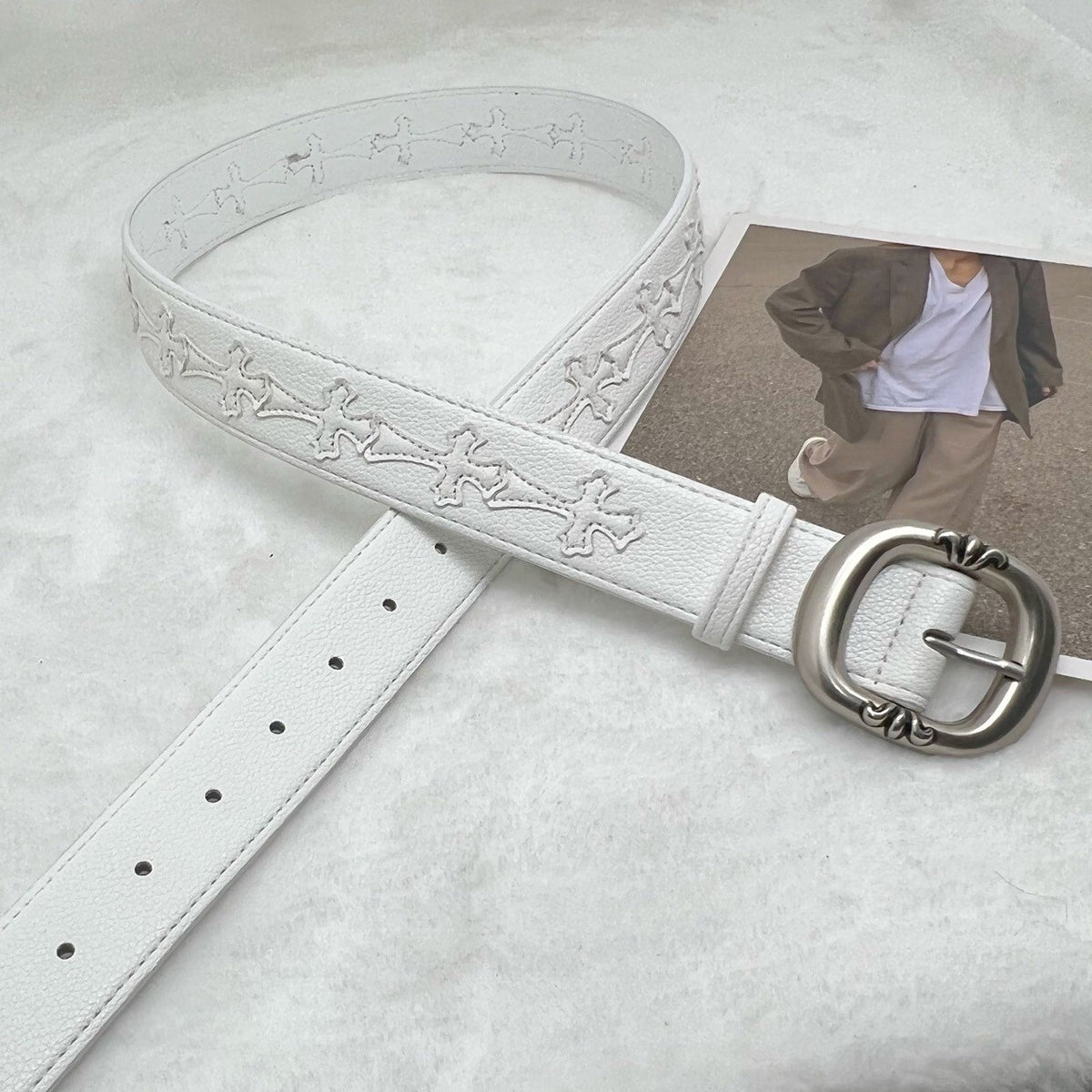 Cross with belt