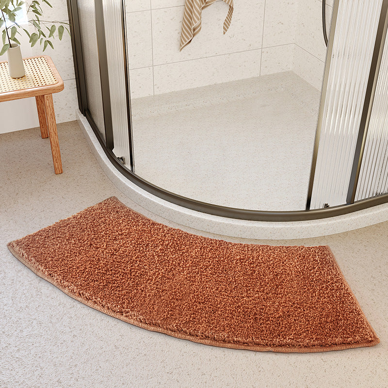 Curved floor mat for the bathroom