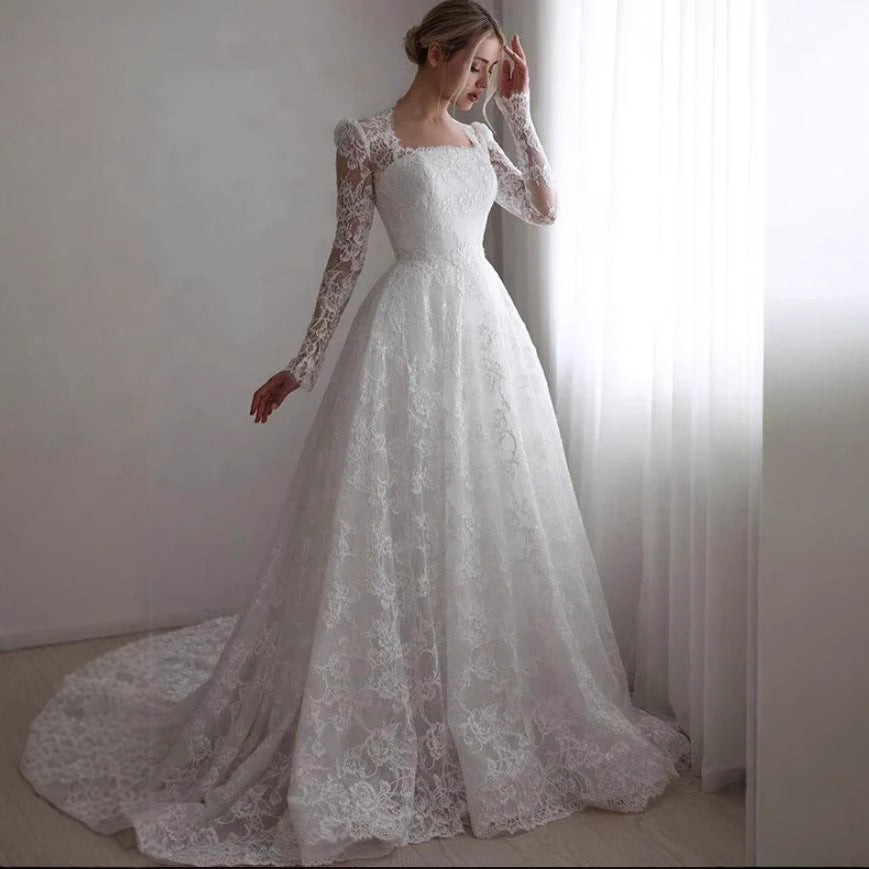 Embroidered Long Sleeve Trailing Wedding Dress for Brides