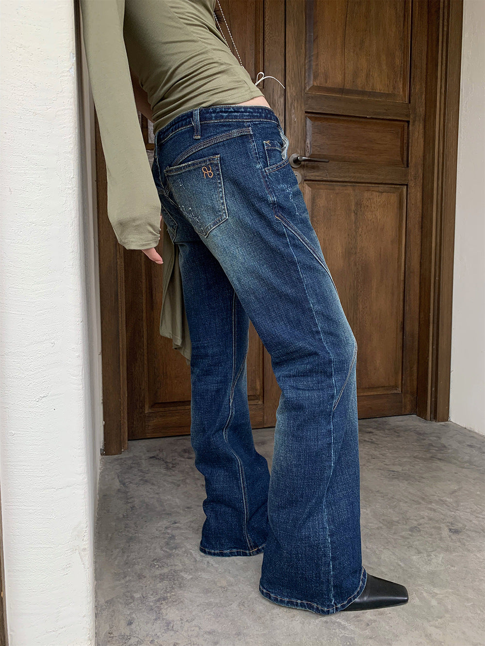 Deconstructed Flared Low-Waist Jeans