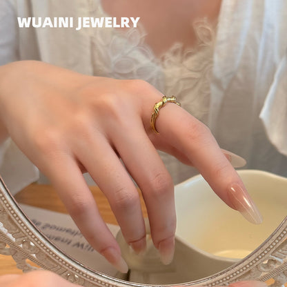 delicate twisted ring