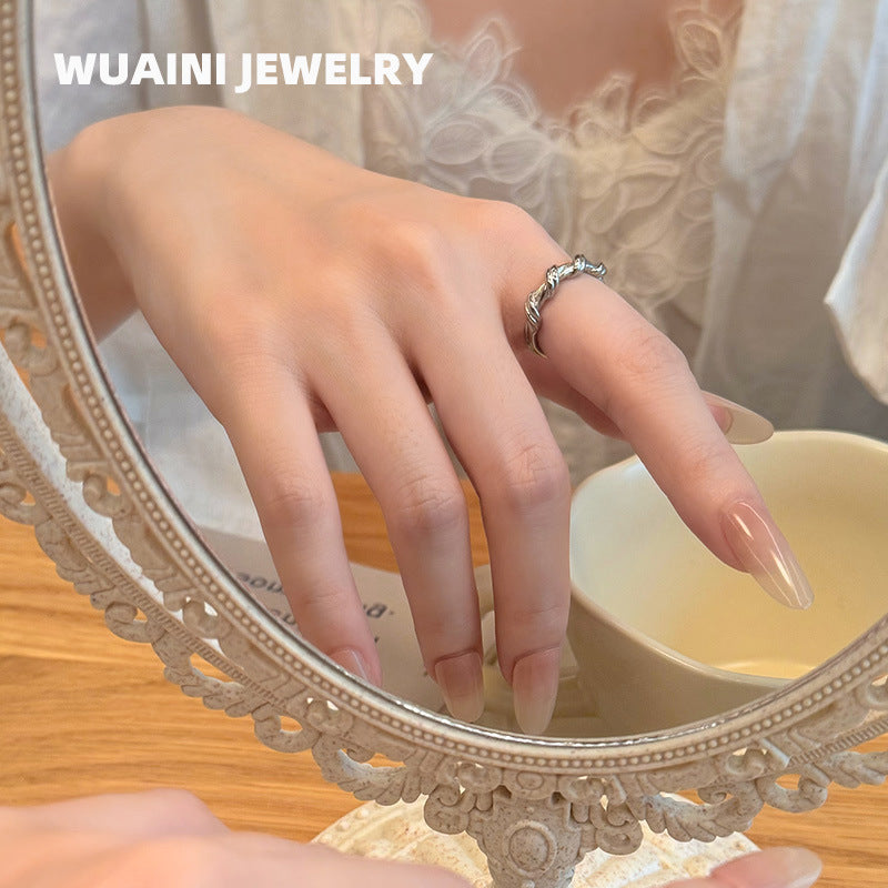 delicate twisted ring