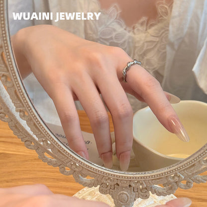 delicate twisted ring