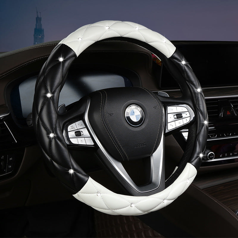 Diamond-encrusted steering wheel covers for automobiles