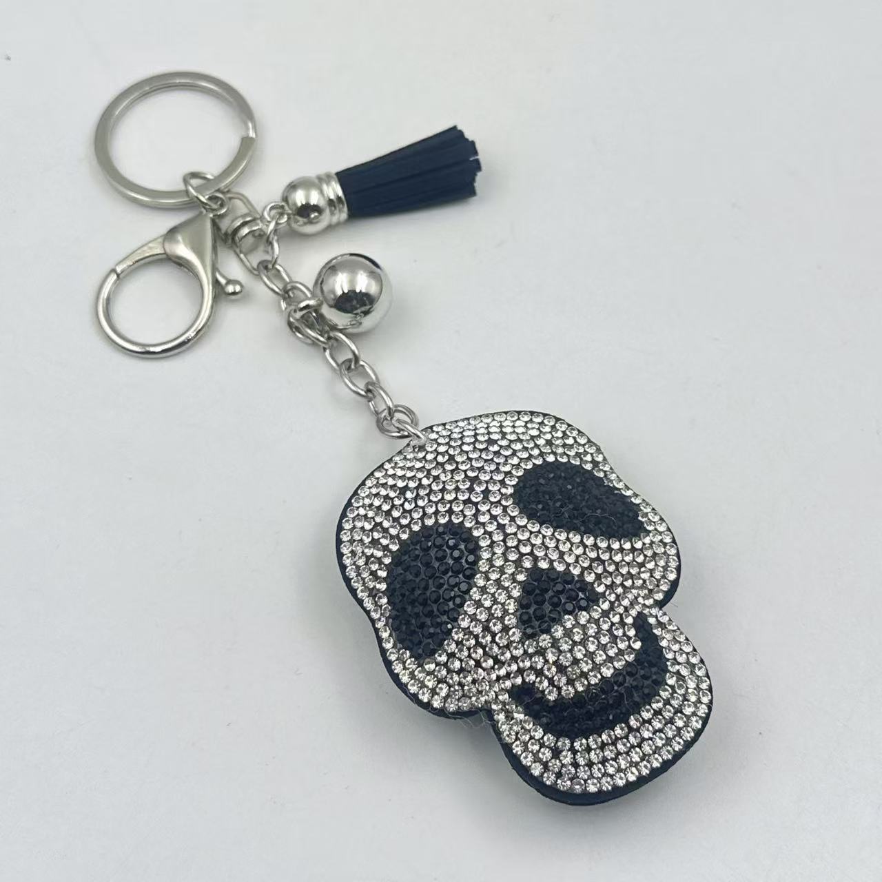 Diamond-studded and rhinestone-studded keychain