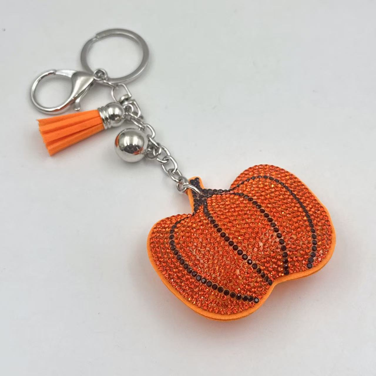 Diamond-studded and rhinestone-studded keychain