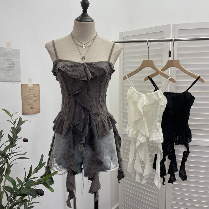 Distressed asymmetric hem camisole top