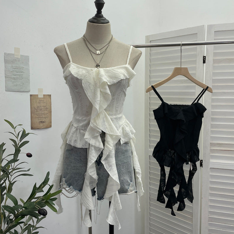 Distressed asymmetric hem camisole top