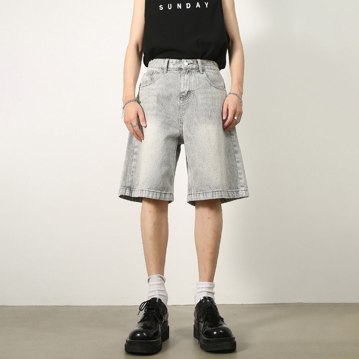 Distressed blue denim shorts