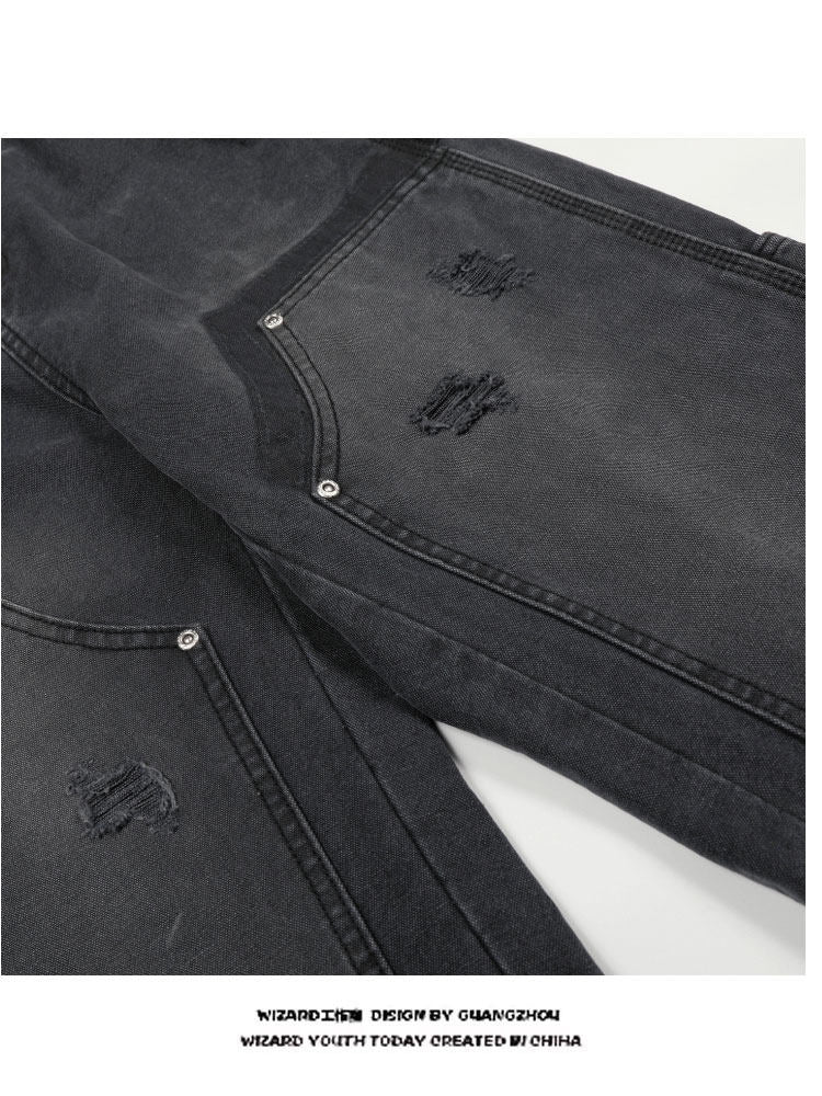 Distressed washed jeans