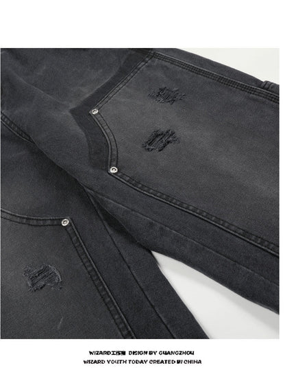 Distressed washed jeans