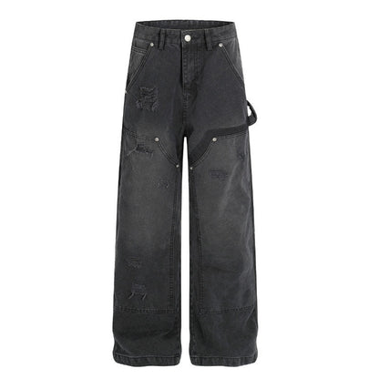 Distressed washed jeans