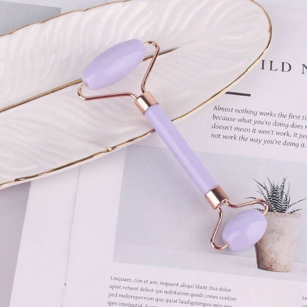 Double-headed roller massager