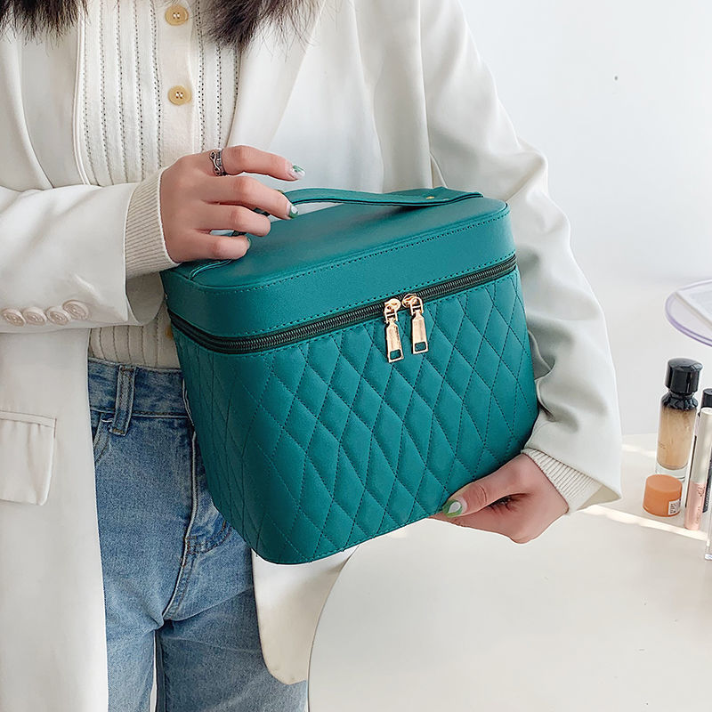 Double-layer cosmetic storage box