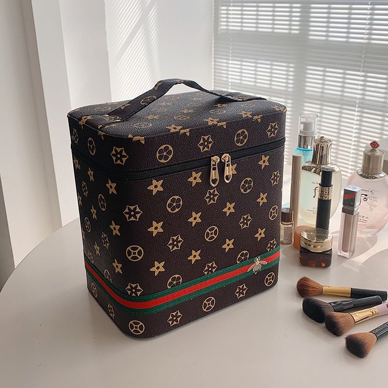 Double-layer cosmetic storage box