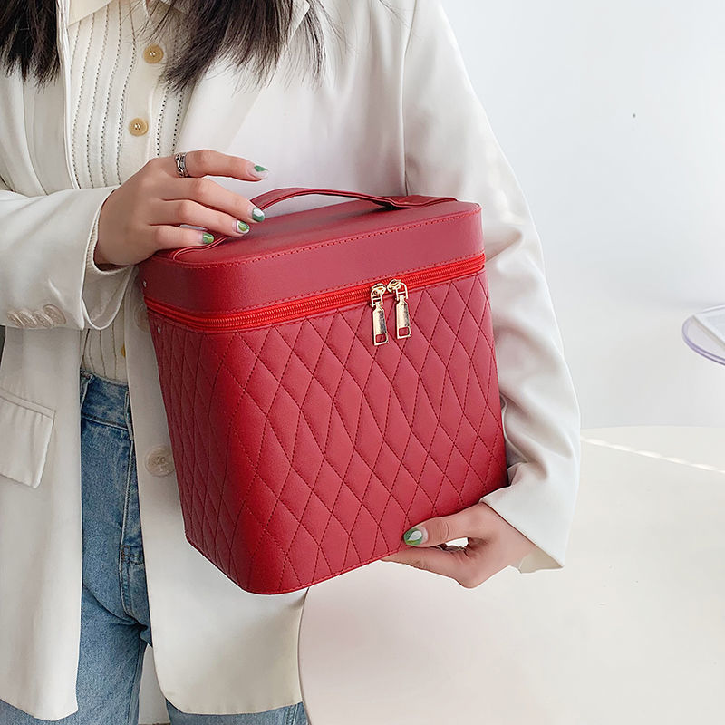 Double-layer cosmetic storage box