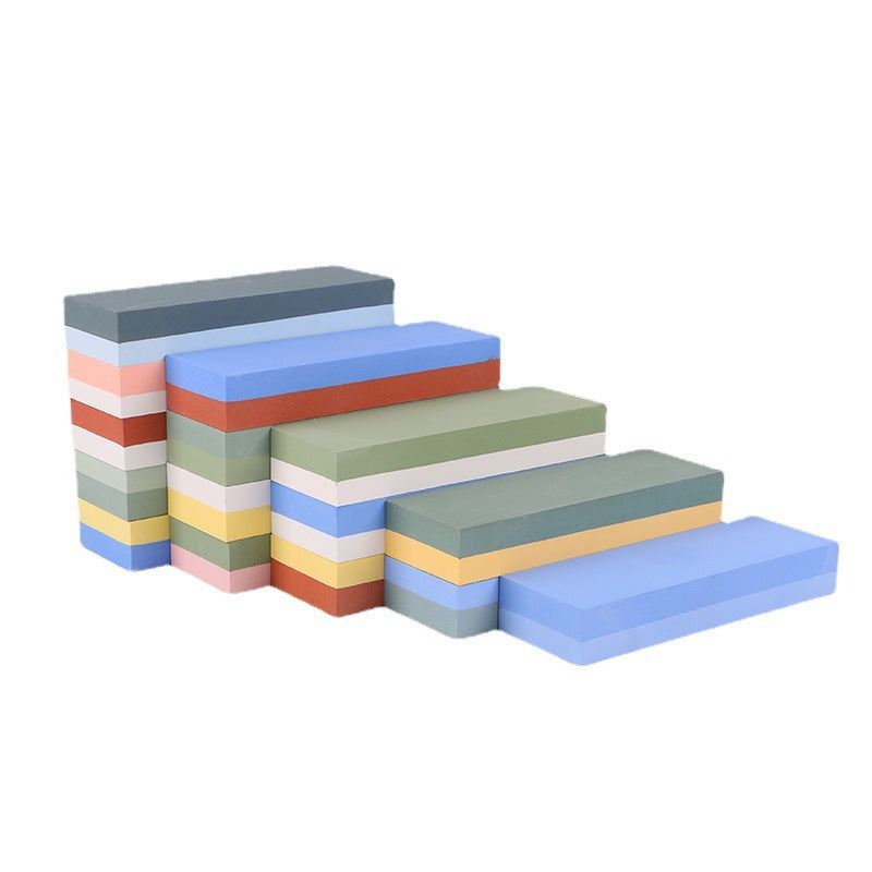 Double-sided sharpening stone for knives
