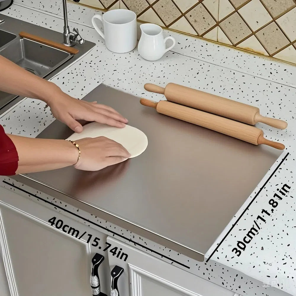 Stainless steel cutting board, medium 40 x 30 cm, on a kitchen counter