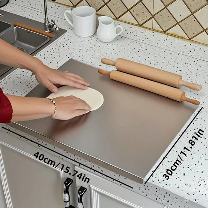 Stainless steel cutting board, medium 40 x 30 cm, on a kitchen counter