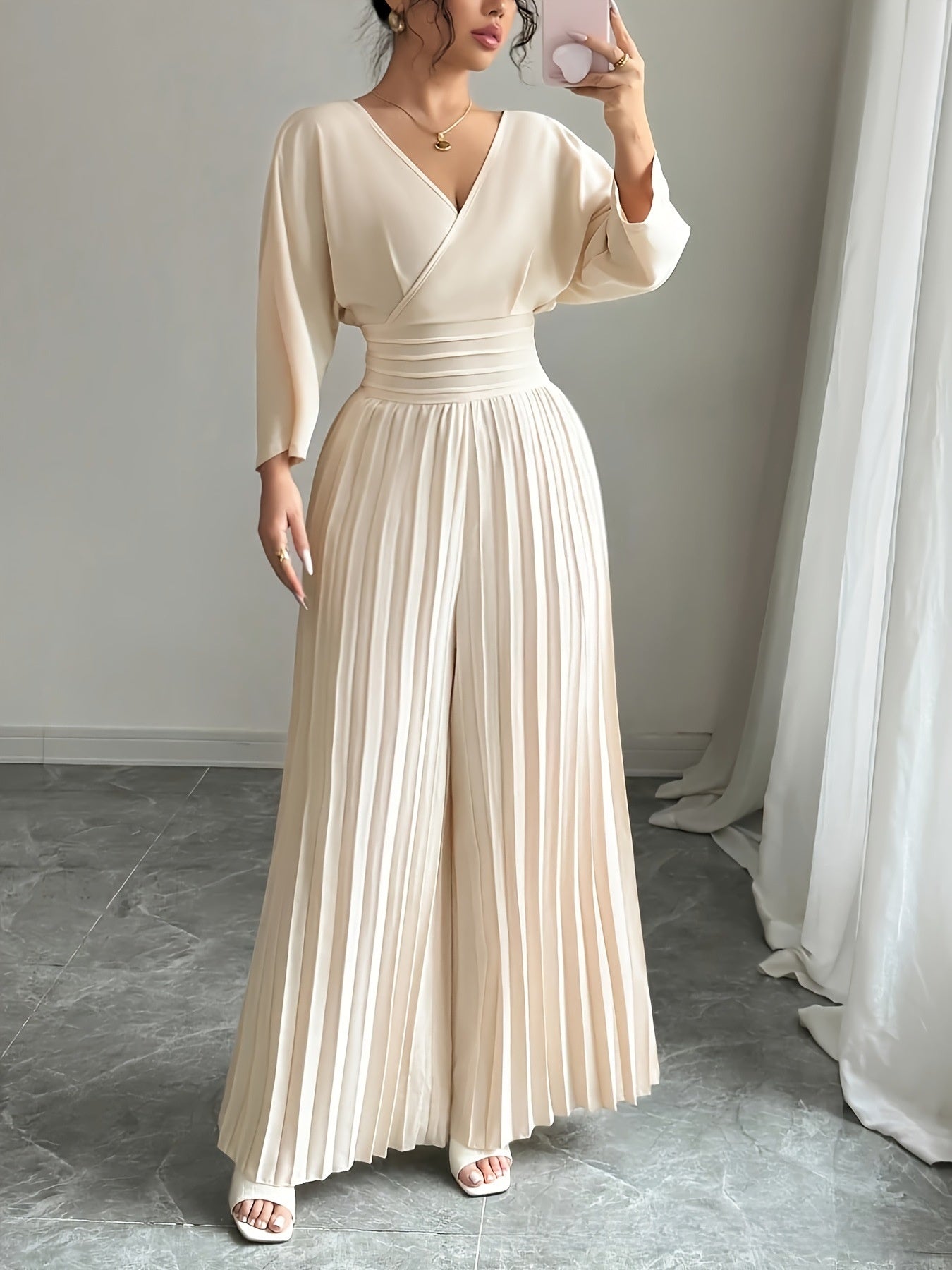 Elegant V-Neck High-Waisted Pleated Jumpsuit