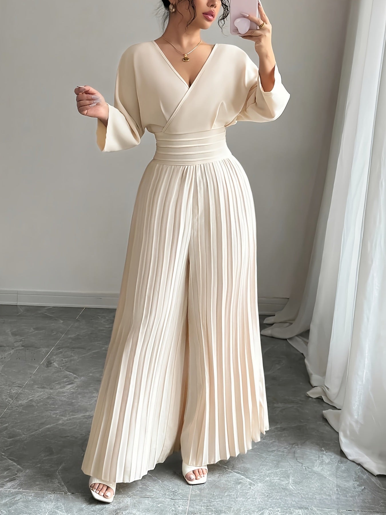 Elegant V-Neck High-Waisted Pleated Jumpsuit