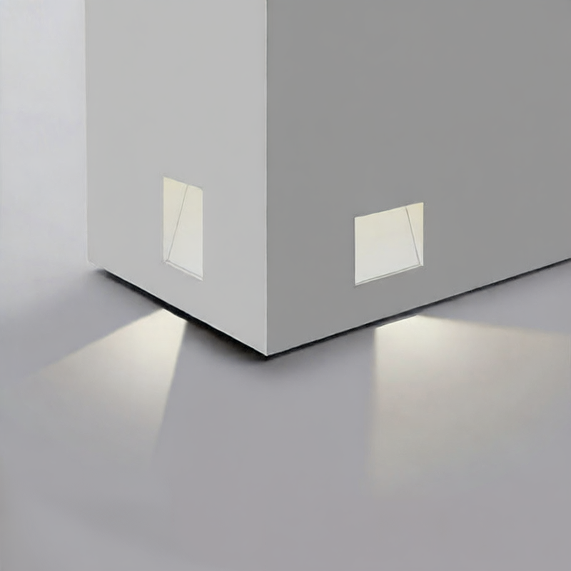Embedded frameless induction skirting light