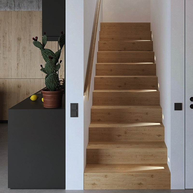 Embedded frameless induction skirting light