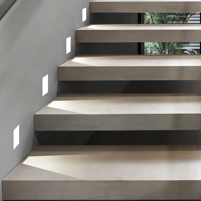 Embedded frameless induction skirting light