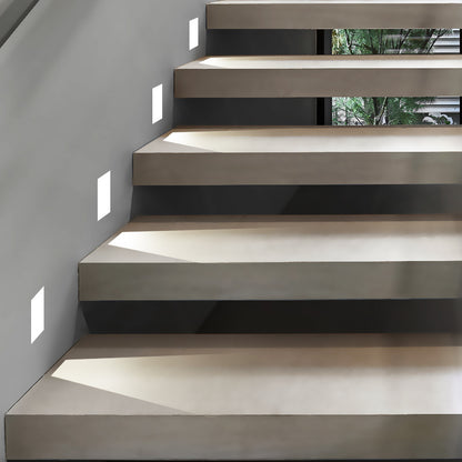 Embedded frameless induction skirting light