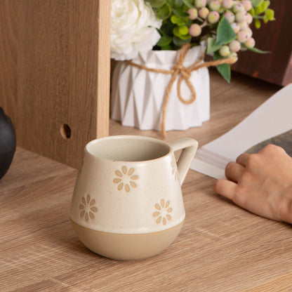 Embossed ceramic mug with creative design