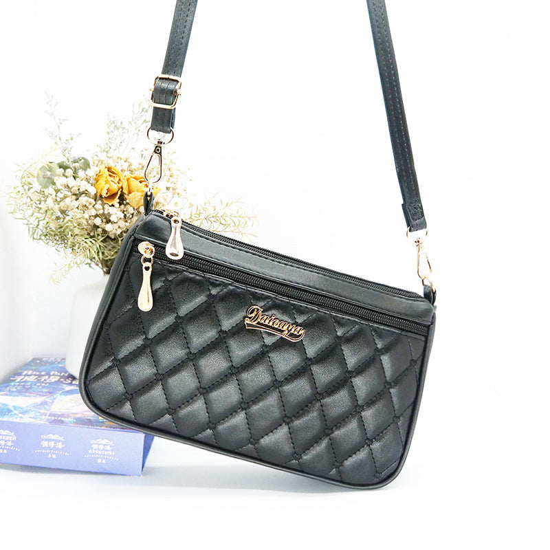 embroidered shoulder bag