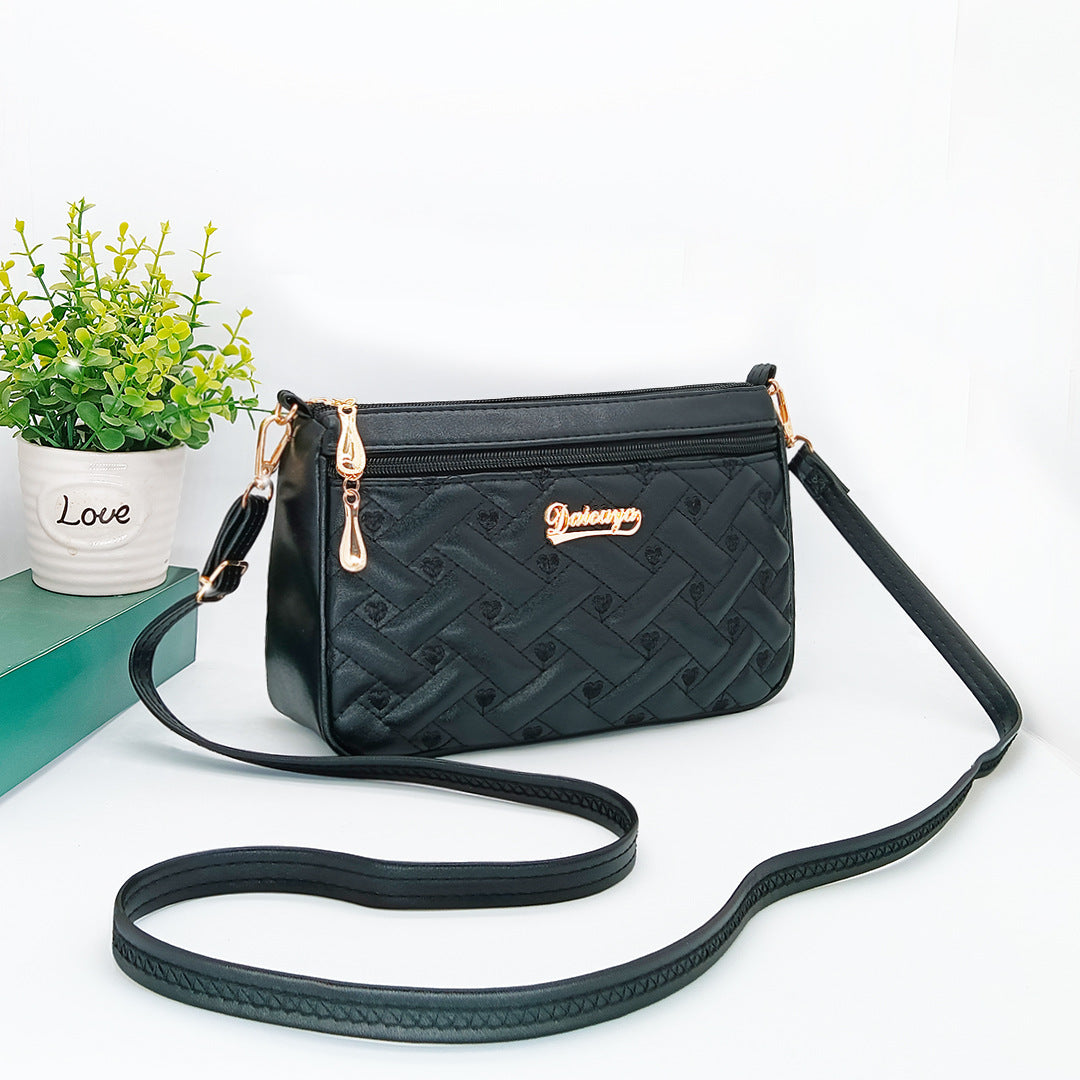 embroidered shoulder bag