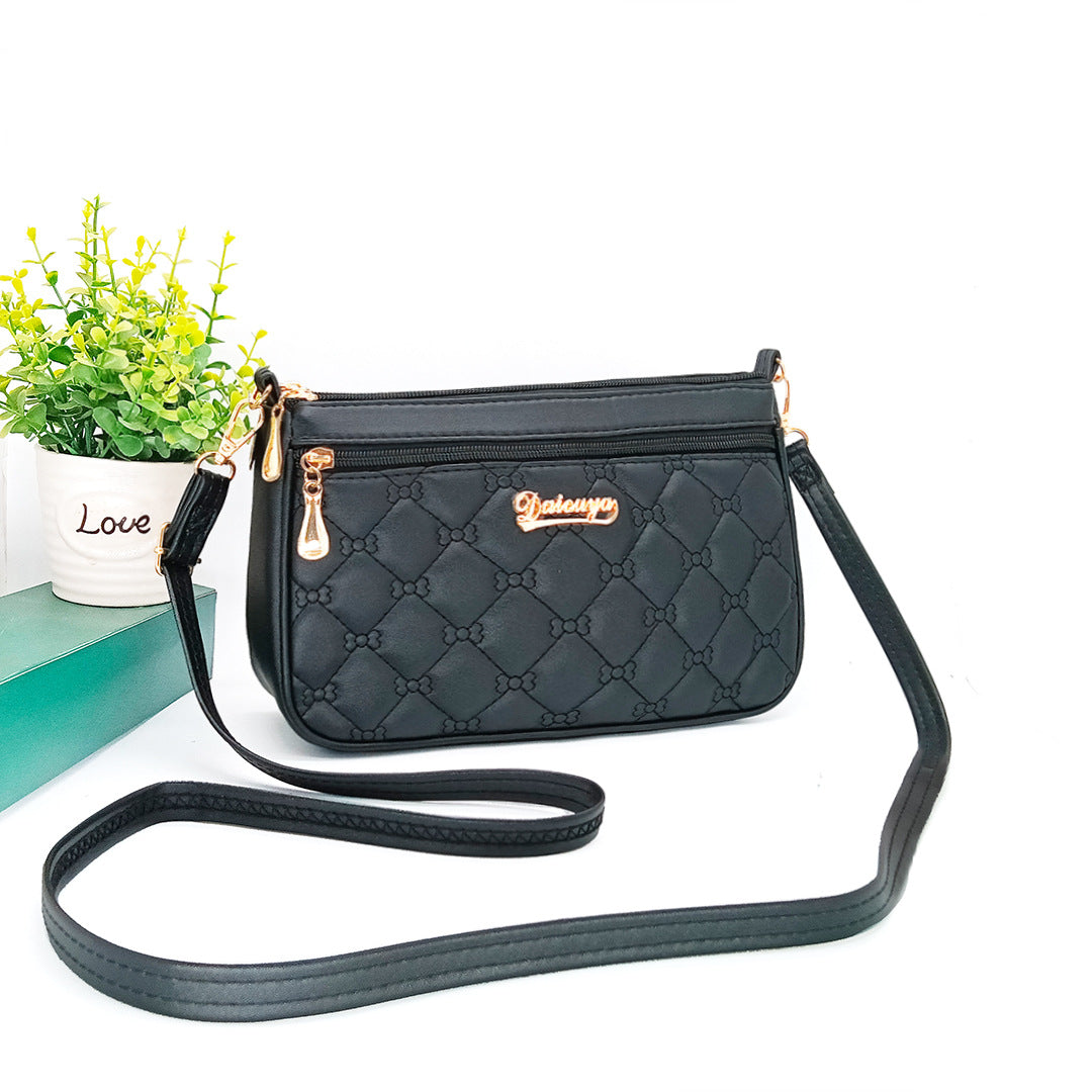 embroidered shoulder bag