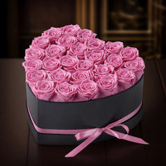 7 red flowers in black box