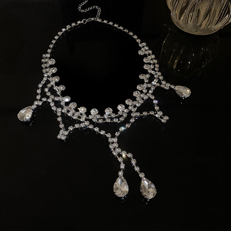 Exquisite diamond-set drop pearl necklace