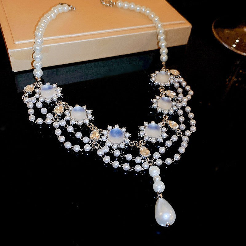 Exquisite diamond-set drop pearl necklace