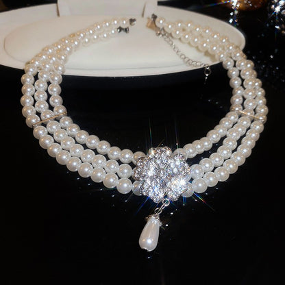 Exquisite diamond-set drop pearl necklace