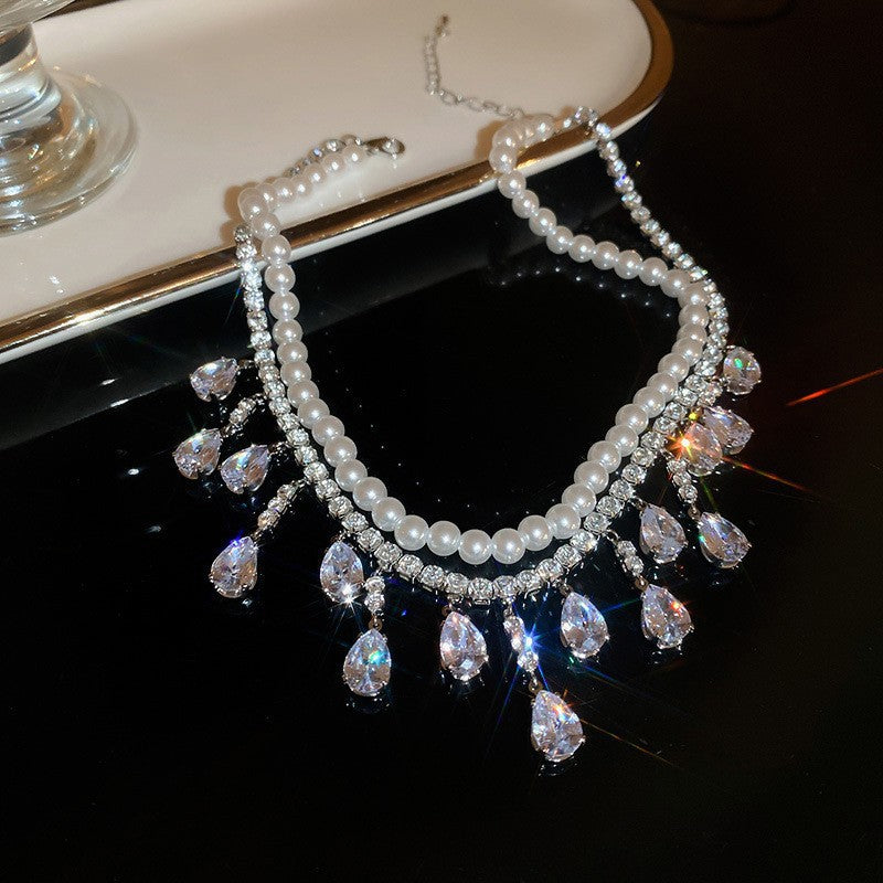 Exquisite diamond-set drop pearl necklace