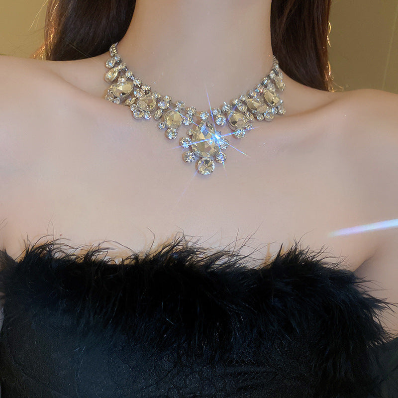 Exquisite diamond-set drop pearl necklace