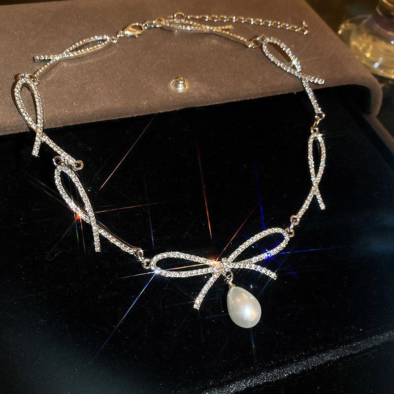 Exquisite diamond-set drop pearl necklace