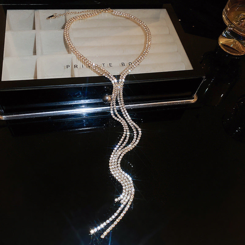 Exquisite diamond-set drop pearl necklace