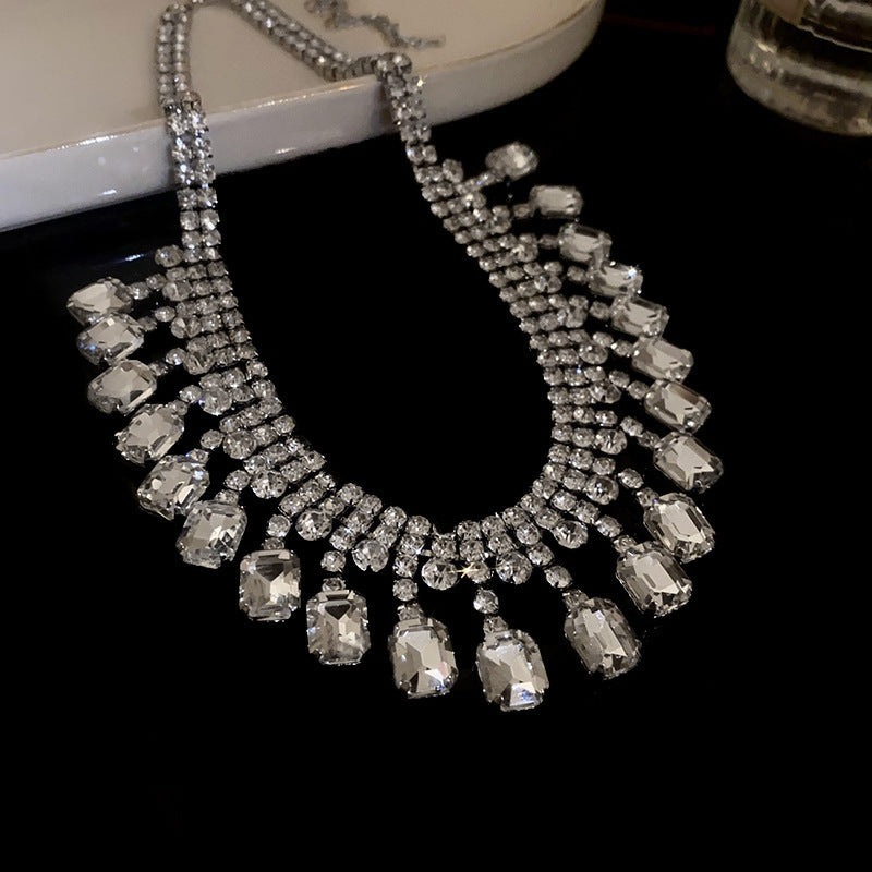 Exquisite diamond-set drop pearl necklace
