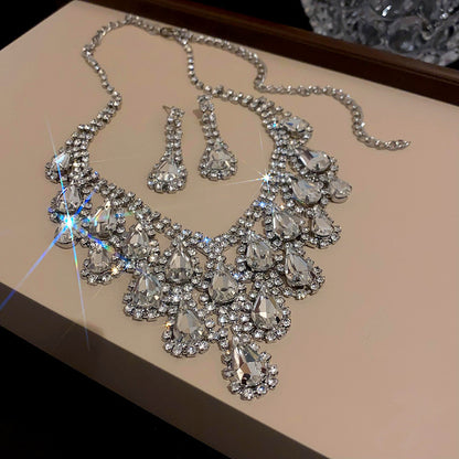 Exquisite diamond-set drop pearl necklace