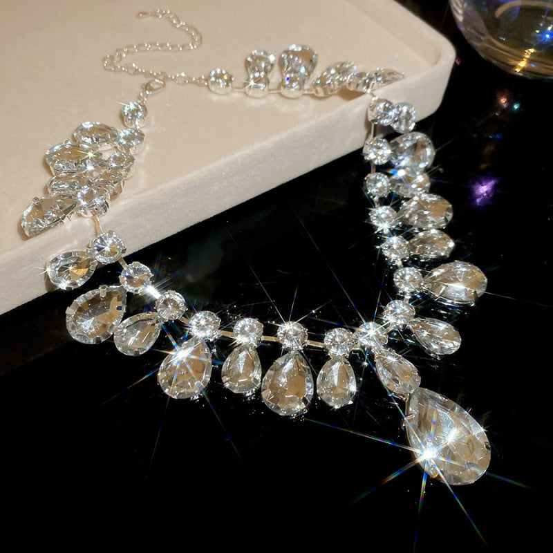 Exquisite diamond-set drop pearl necklace