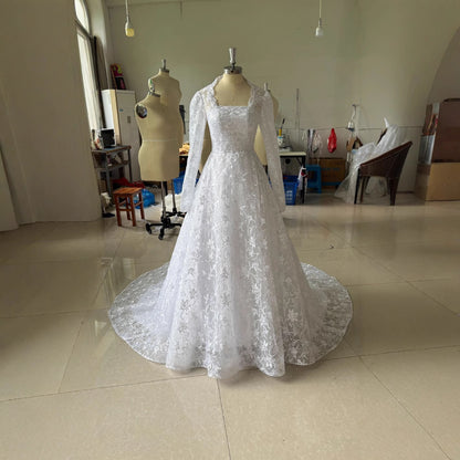 Embroidered Long Sleeve Trailing Wedding Dress for Brides