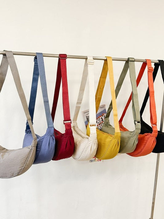 Fashionable crescent-shaped crossbody bag