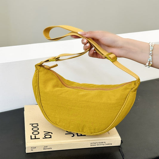 Fashionable crescent-shaped crossbody bag